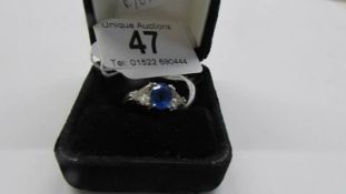 A silver ring set blue stone, size T, 5.3 grams.