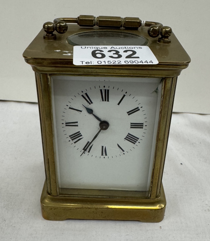 An Edwardian brass carriage clock with key