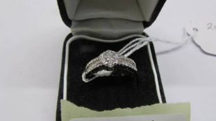 A white gold and diamond ring, size N half, 3.62 grams.