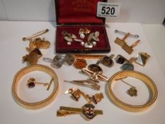 A mixed lot of cuff links, tie pins etc.,