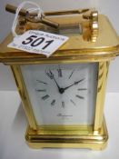 A good quality mid 20th century brass repeating carriage clock by Rapport, London, in working order.