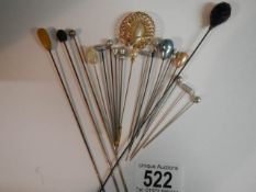 Eighteen assorted hat pins.