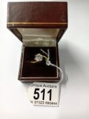 A single stone gilded dress ring.