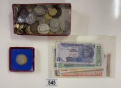 A quantity of mixed coins and bank notes