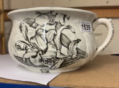 A vintage chamber pot/planter