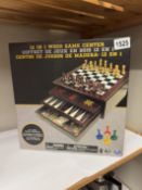 A new boxed wooden 12 in 1 games compendium