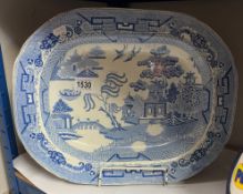 A large blue & white Willow pattern meat platter