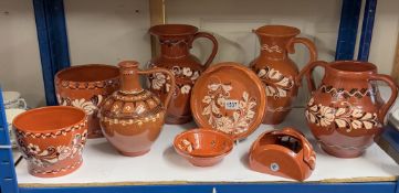 A quantity of terracotta including vases & planters etc