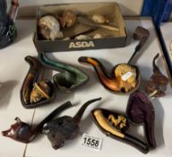 A quantity of vintage pipes including Meercham, carved wood & clay