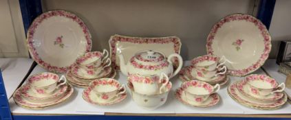 A Royal Doulton Baby Rose tea set