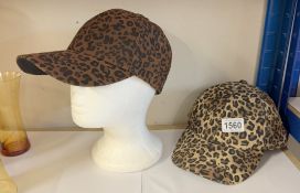 2 animal print caps