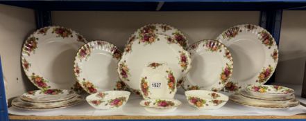 A quantity of Royal Albert Country Rose dinner items
