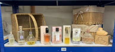 A wicker bottle basket & 1 other & a quantity of used & unused perfumes