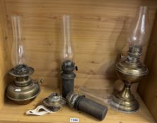 A selection of brass oil lamps etc