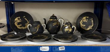 A black & gold Chinese tea set featuring dragons (No cups & saucers)
