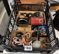 A good selection of vintage costume jewellery including compacts