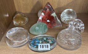 A quantity of glass paperweights