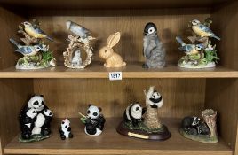 A quantity of resin & ceramic ornaments including Sylvac rabbit