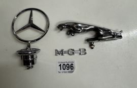A Jaguar & Mercedes car mascot & An MGB badge