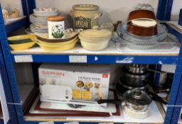 A good lot of Kitchenalia including Pyrex dishes, jelly moulds etc (on 2 shelves)