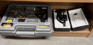 An incomplete microscope set & a cased microscope