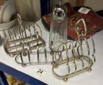 3 silver plate toast racks and a sugar sifter