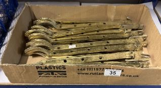 A box of brass window latches/catches