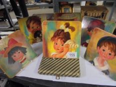 A cased set of six vintage WEL-EL-WARE coasters of children.