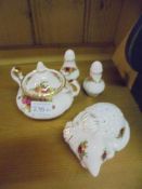 Four pieces of Royal Albert Old Country Roses including sugar bowl and cat hat pin stand.