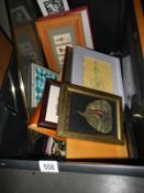 A box of assorted pictures.