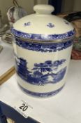 A blue and white Ringtons biscuit jar