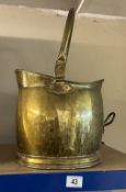 A brass coal scuttle