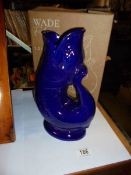 A Wade fish 'glug' jug in box.