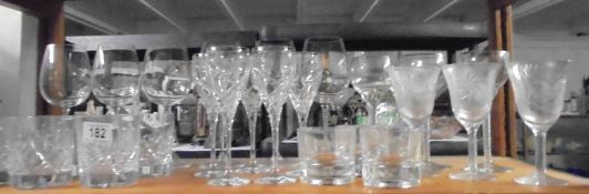 A mixed lot of crystal wine glasses and other glassware.