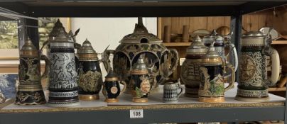 A quantity of beer steins & a lidded tureen