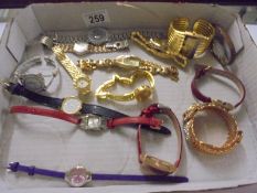 A quantity of ladies wrist watches, compact, bracelet etc.,