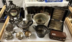 A good selection of plated metalware including tea set, clock case, money boxes etc