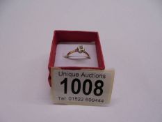 A yellow gold solitaire diamond ring, size N, 1.6 grams.