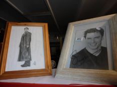 Two framed and glazed portraits of John Barrowman.