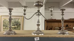 A silver plate candelabra & a pair of silver plated candlesticks