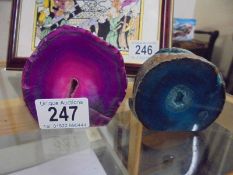 Two pieces of blue and pink agate.