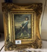 A gilt framed enhanced print of a boy with dog