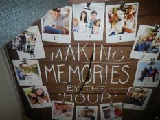 A modern 'Making Memories' wall clock,.