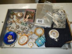 A mixed lot including brooches, watches etc.,