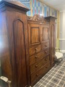 A compendium cabinet wardrobe