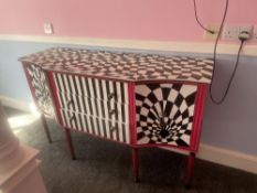An interesting black-and-white checkered-themed sideboard dressing table