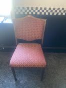 A metal framed bedroom chair