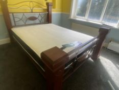 A good large wood and metal framed bed