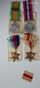 Four WWII medals; Africa Star, 1939-45 Star, War Medal and Defence Medal. EF, in their original
