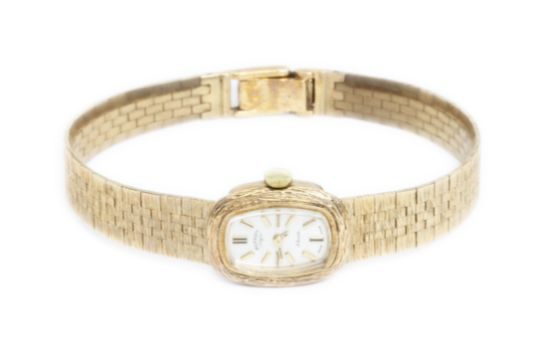 A ladies 9ct gold Rotary wristwatch with integrated 9ct gold textured strap, length 17.5cm, gross